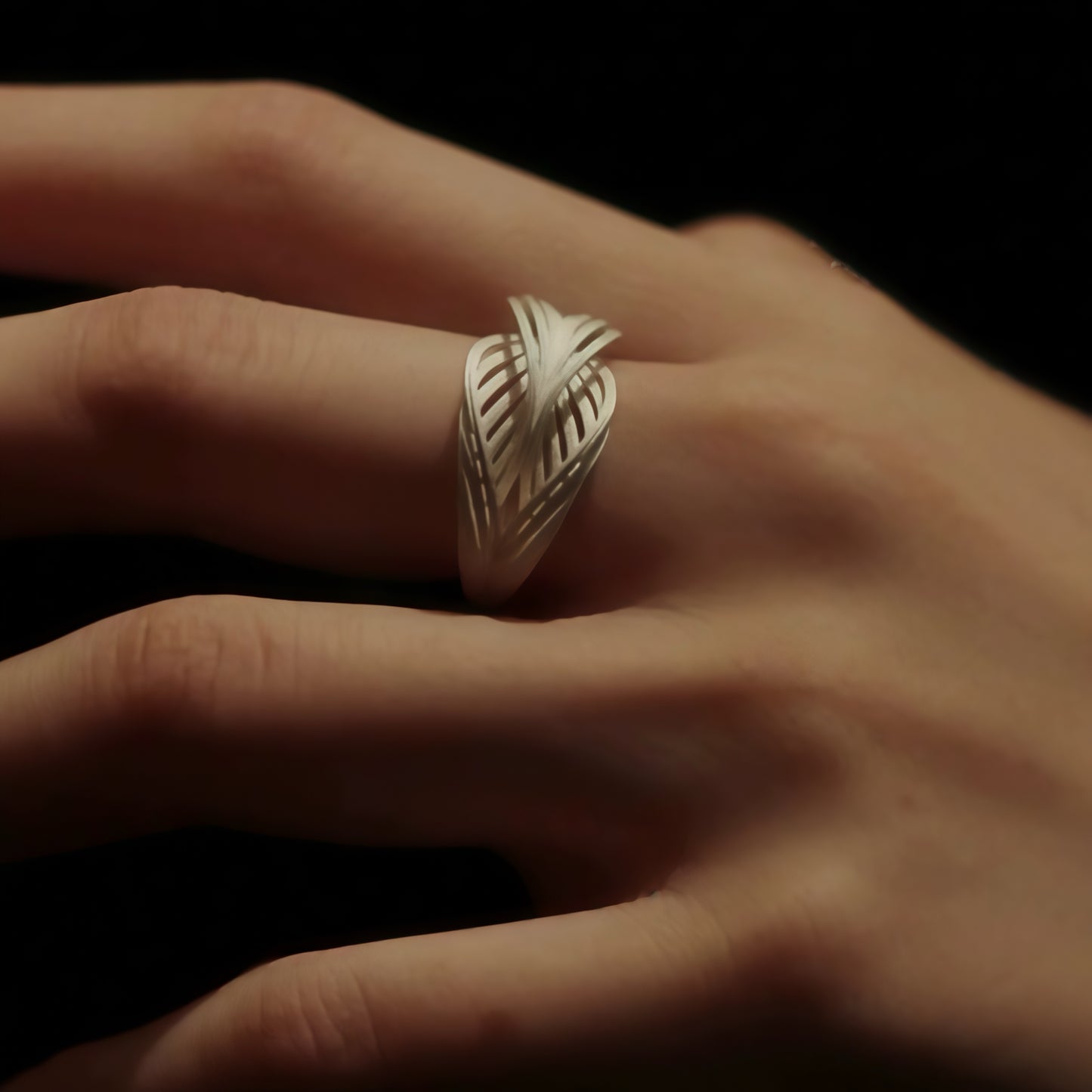 Interwoven Silver Statement Ring – Modern Sculptural Design