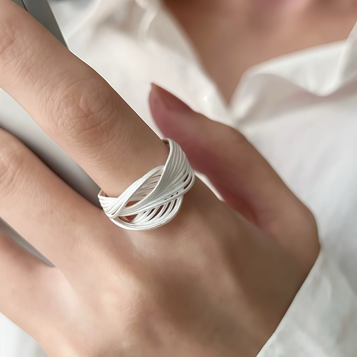 Interwoven Silver Statement Ring – Modern Sculptural Design