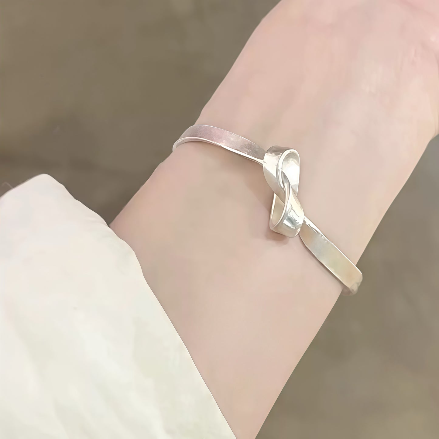 Knoted Ribbon Bangle – Adjustable Silver Bracelet