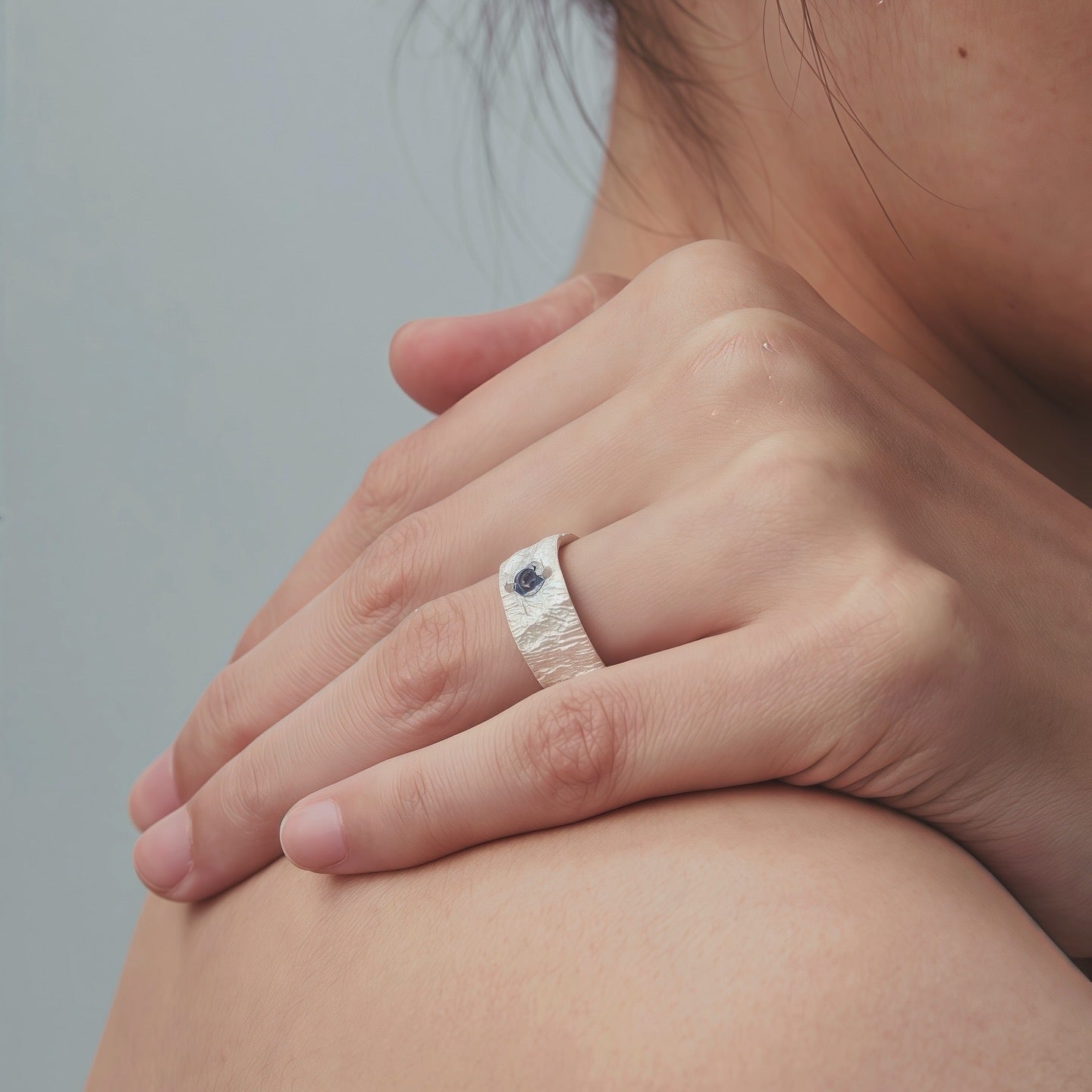 Aurora Crest Ring — Textured Silver with Ice-Blue Gem