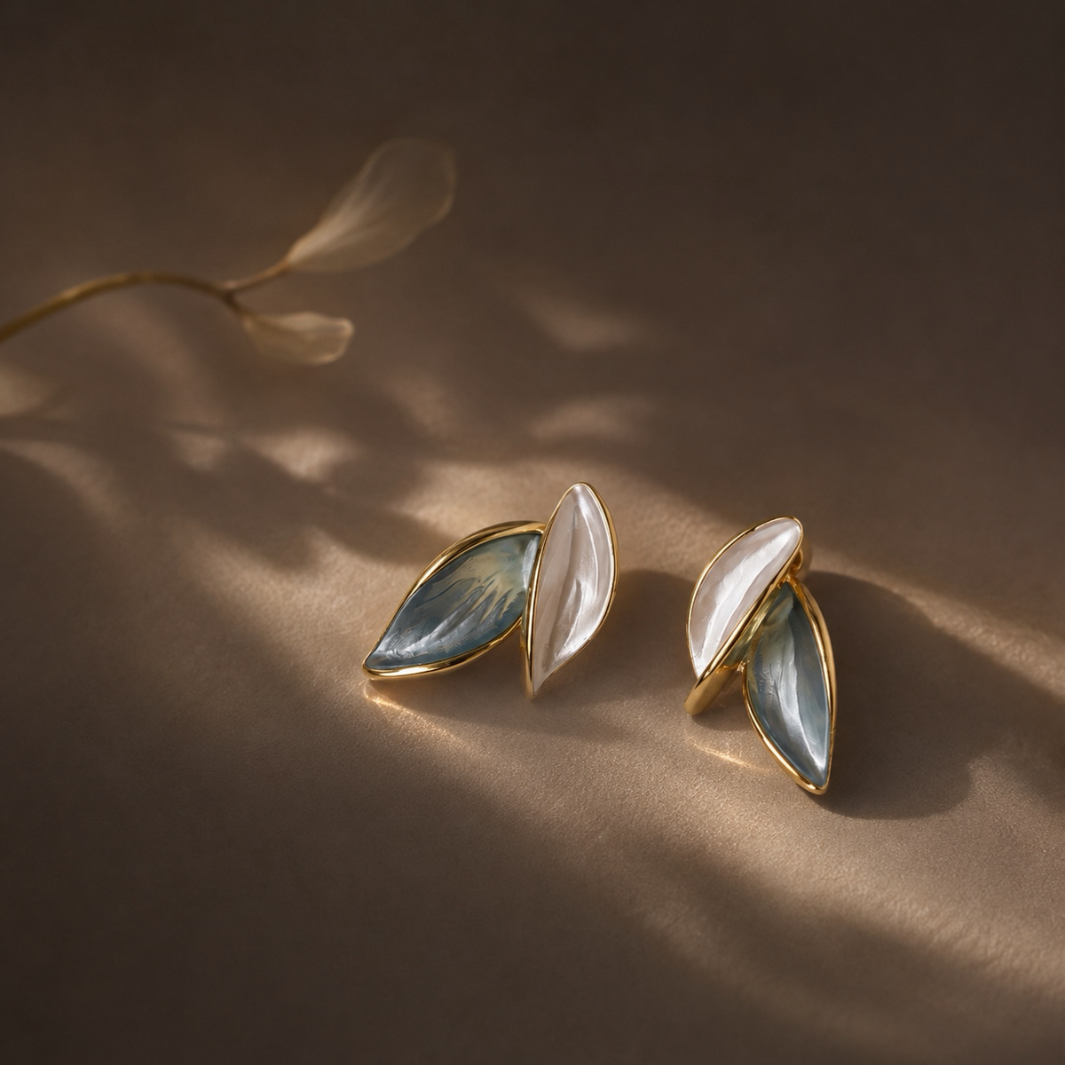 Between Light Leaf Earrings