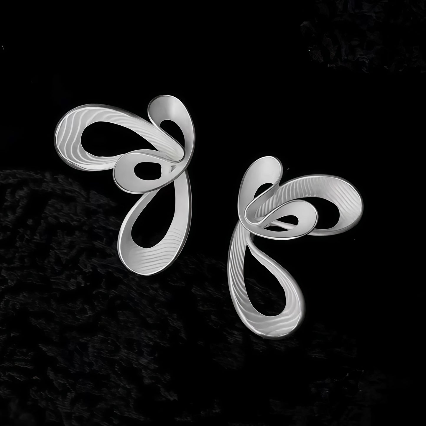 Cloudflow Silver Earrings – Sculptural Statement Inspired by Moving Skies