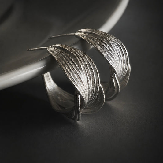 Interwoven Silver Hoop Earrings