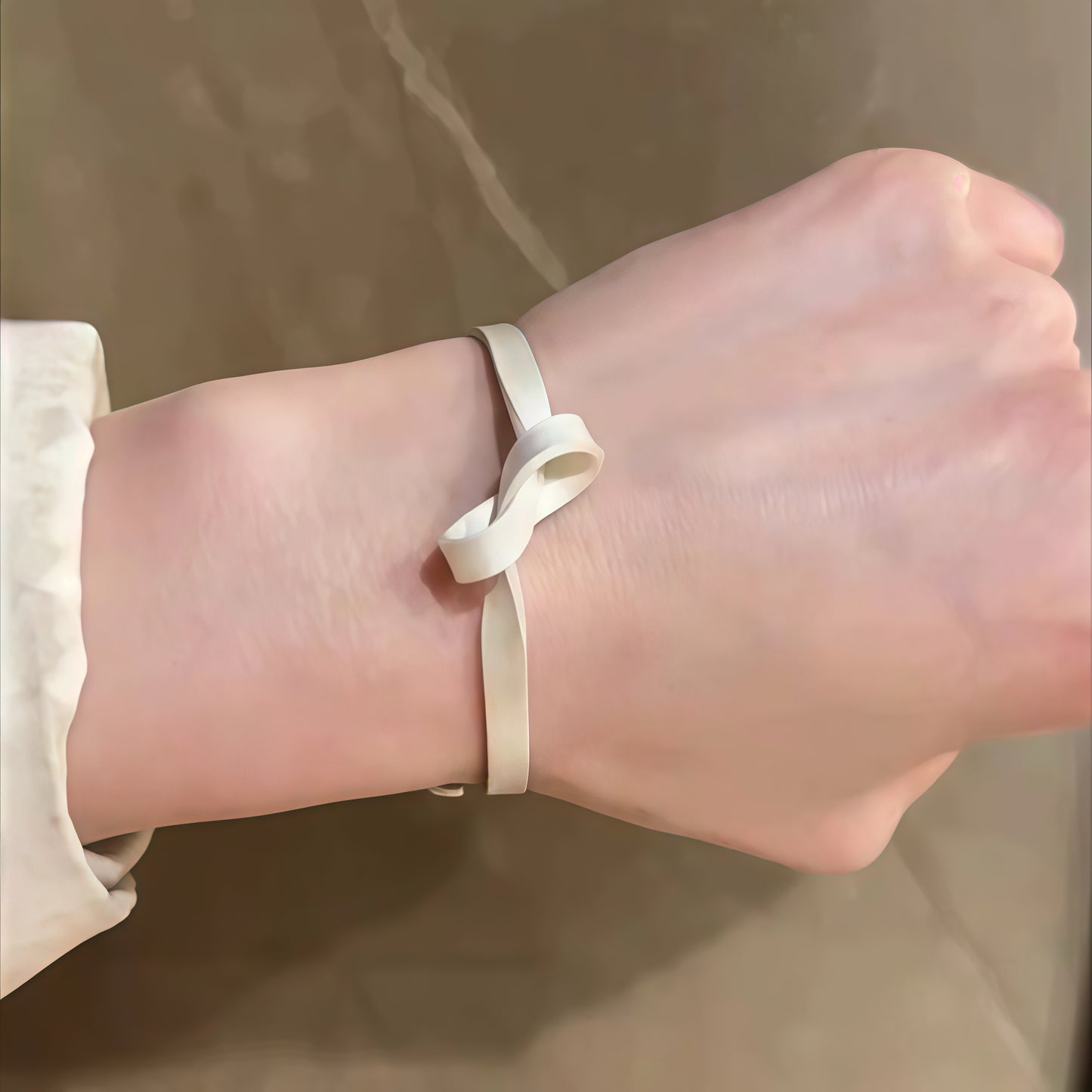 Knoted Ribbon Bangle – Adjustable Silver Bracelet