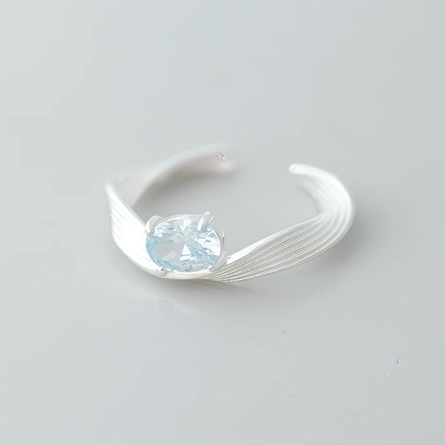 Ocean Whisper Ring – Sterling Silver with Sky Blue Gemstone