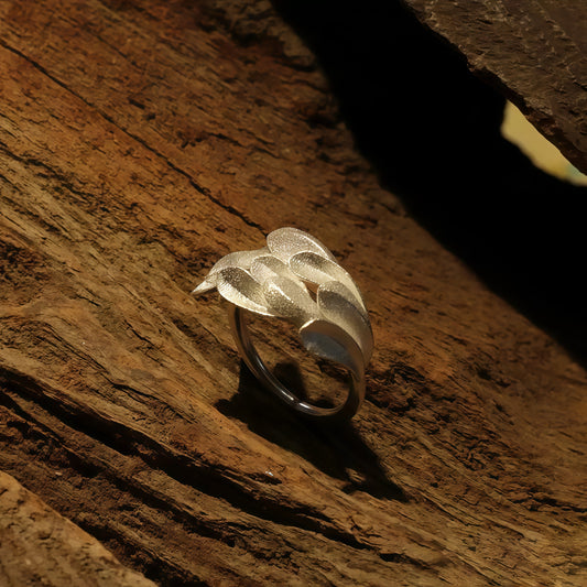 Silver Feather Bloom Ring — A Soft Wing Unfolding on the Hand