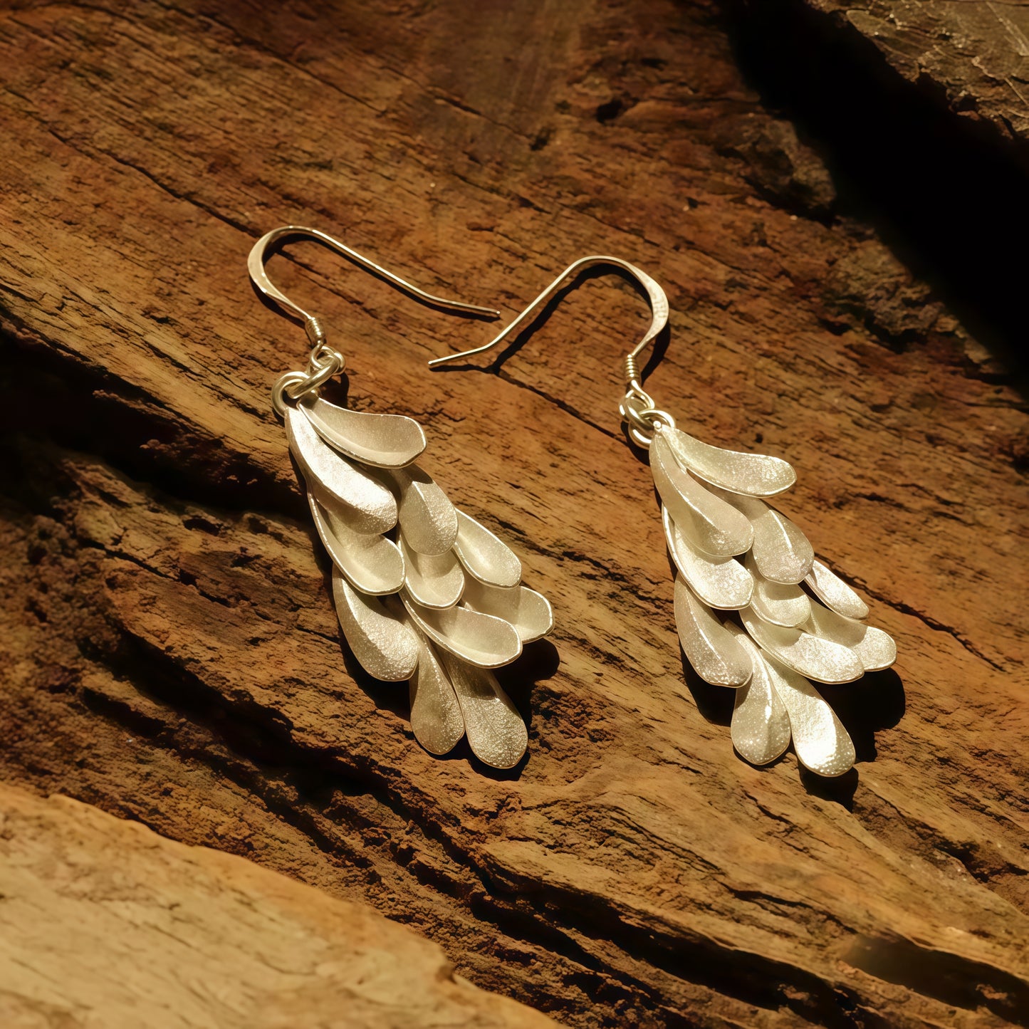 Silver Feather Cascade Earrings — Light as Air, Strong in Presence