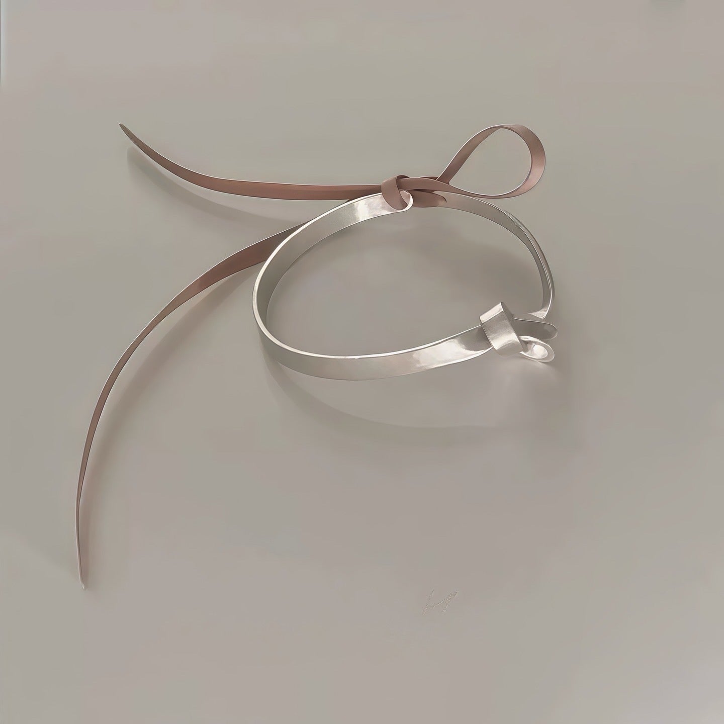 Knoted Ribbon Bangle – Adjustable Silver Bracelet