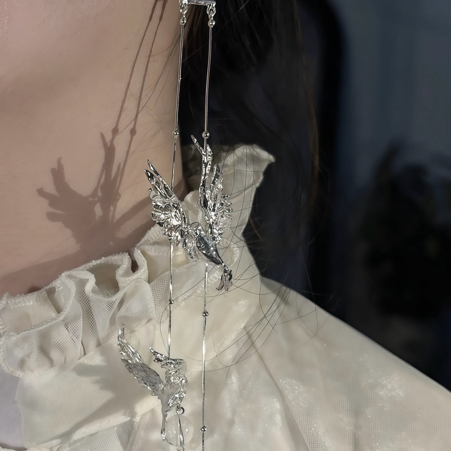 “Flight of Souls” – Sterling Silver Long Bird Earrings