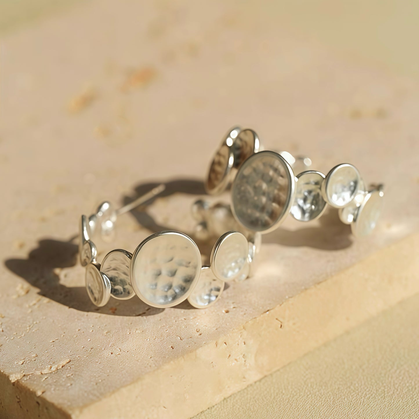 Ripple Moonlight Hoop Earrings — Sculptural Hammered Silver Design