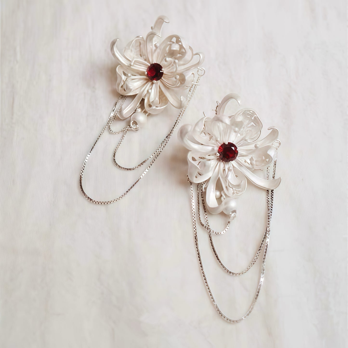 Poetic Bloom Earrings – Silver Floral Statement Earrings with Chain Drapes
