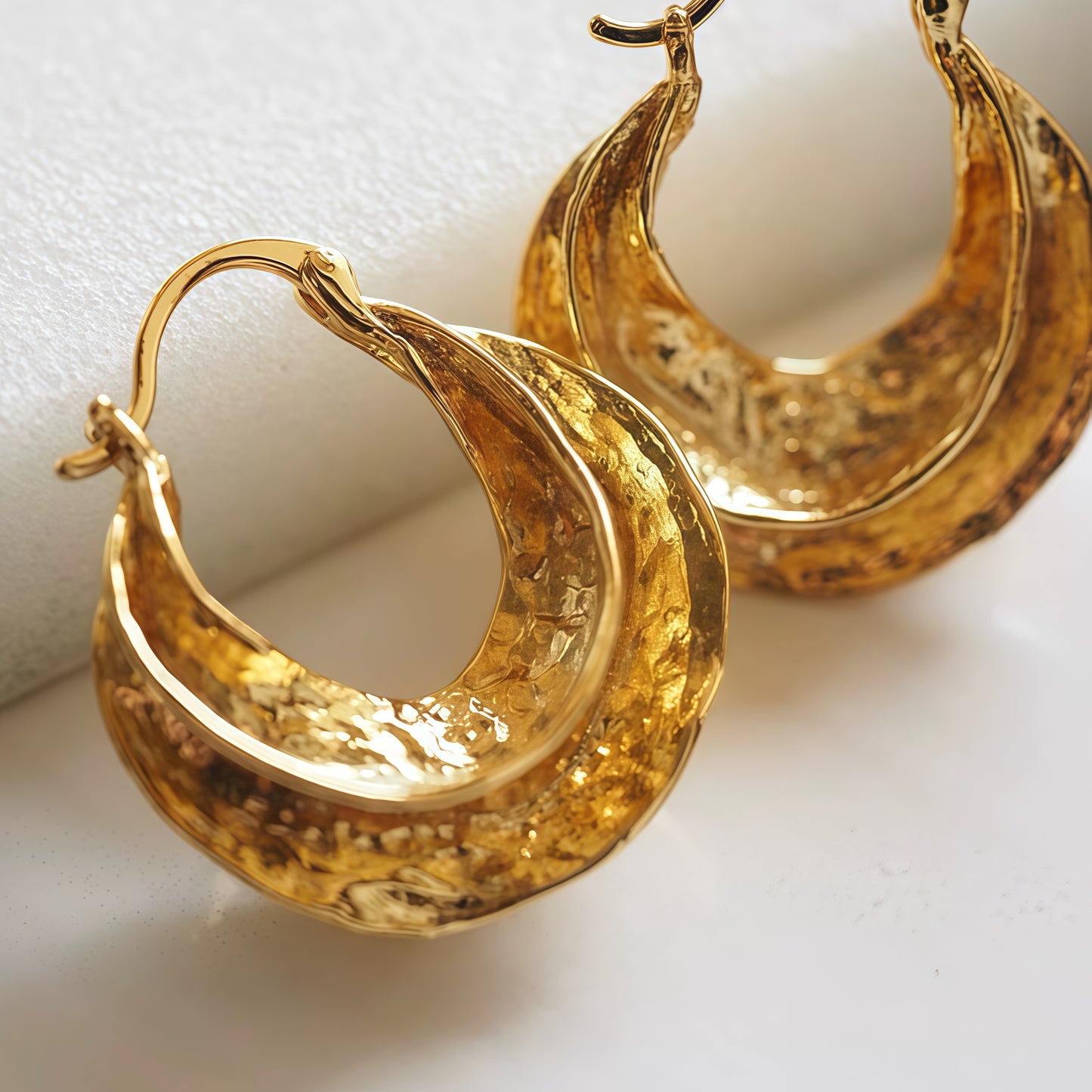 Golden Wave Hoop Earrings – Sculptural Elegance in Motion